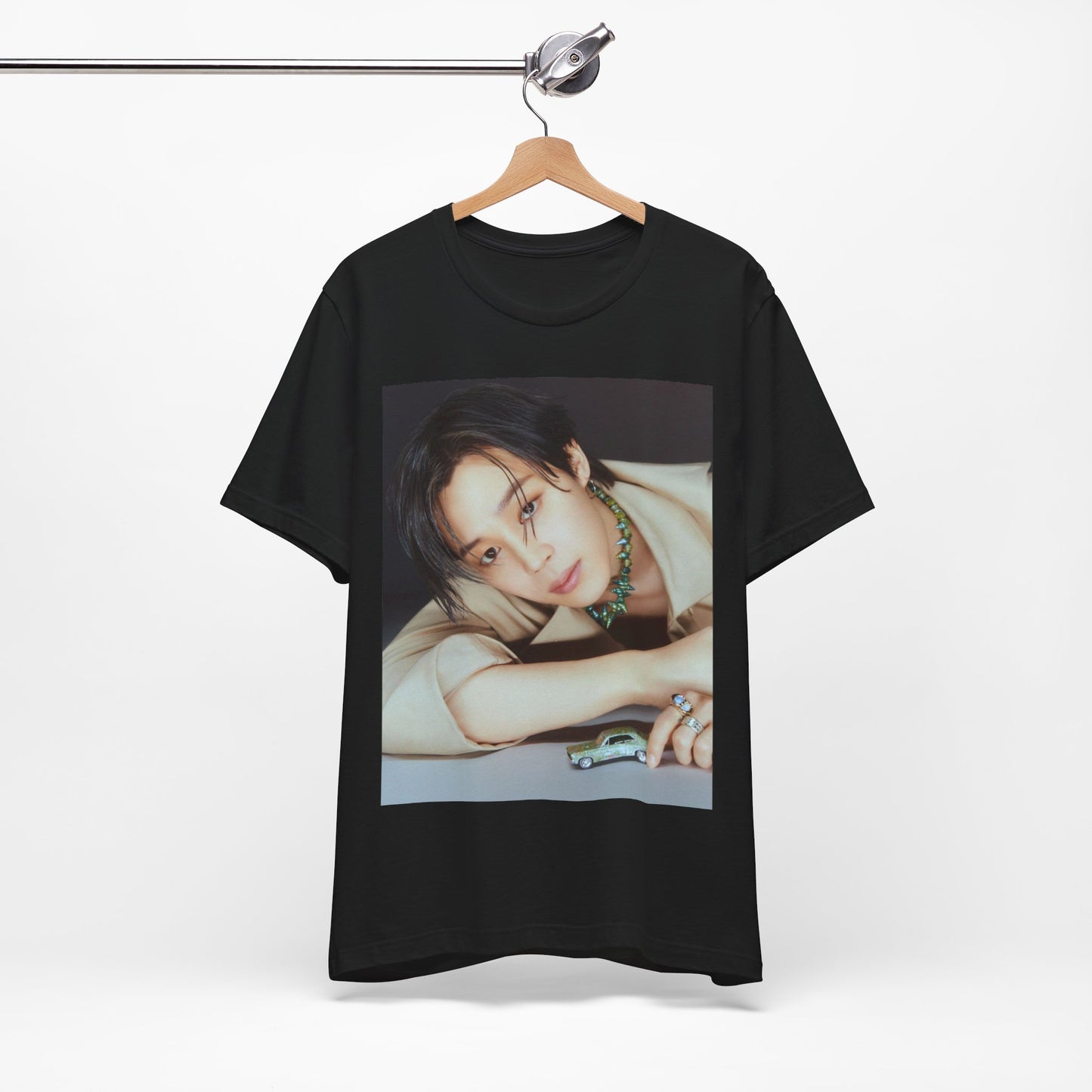 A black graphic t-shirt featuring a retro graphic related to Jimin's 'Filter' era.