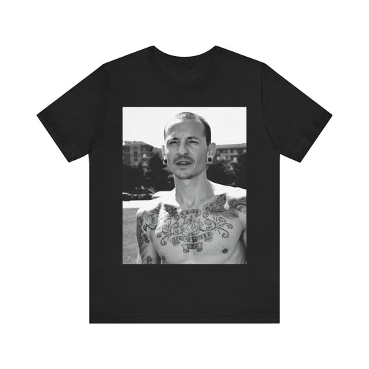 A black graphic t-shirt featuring a black and white graphic or photo portrait of Chester Bennington from Linkin Park.