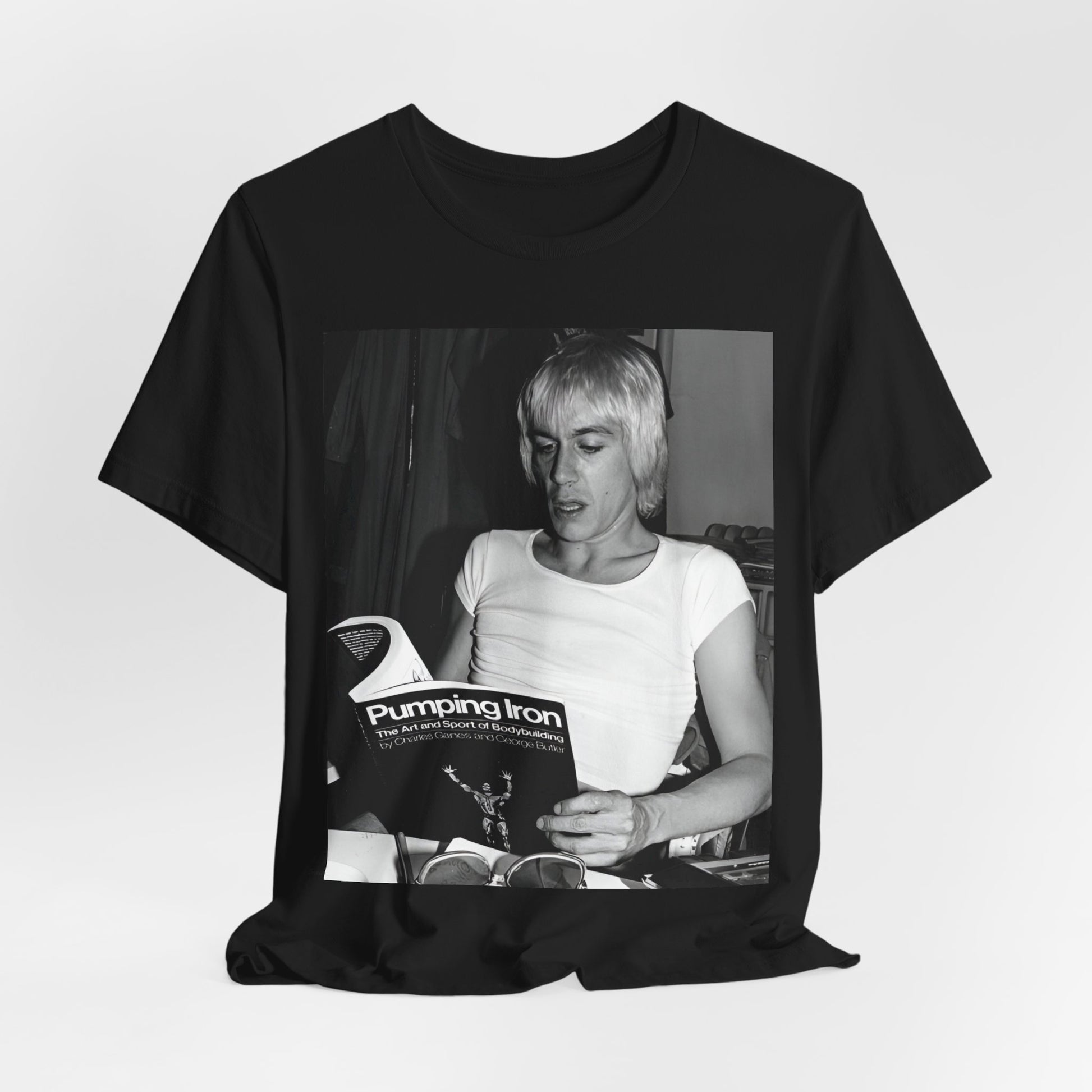 A black graphic t-shirt featuring a 70s classic photo of Iggy Pop and The Stooges.
