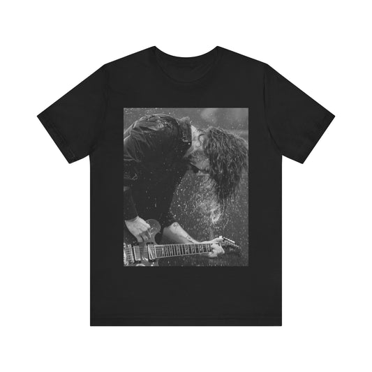 A black graphic t-shirt featuring a graphic of Dave Grohl from Foo Fighters, emphasizing his fierce on-stage presence.