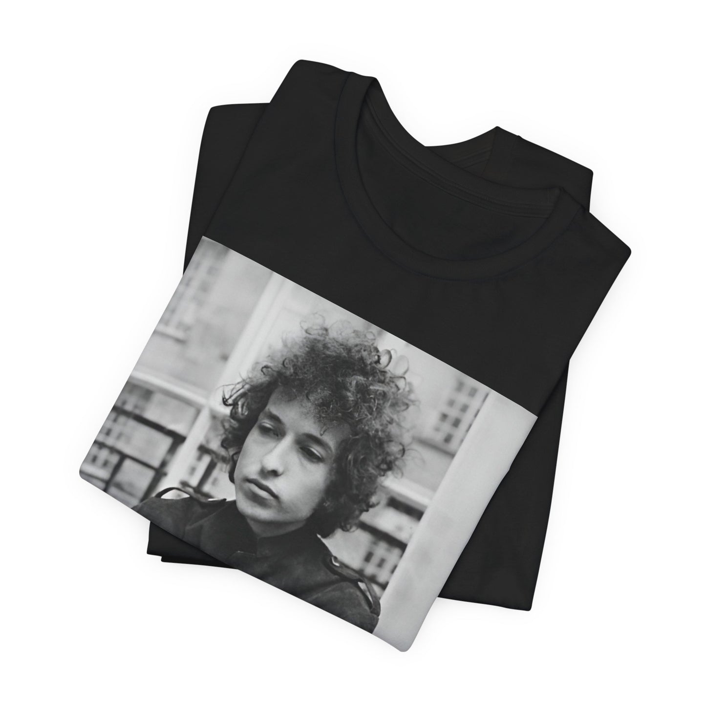 A black graphic t-shirt featuring a black and white graphic of Bob Dylan from the folk revival era.