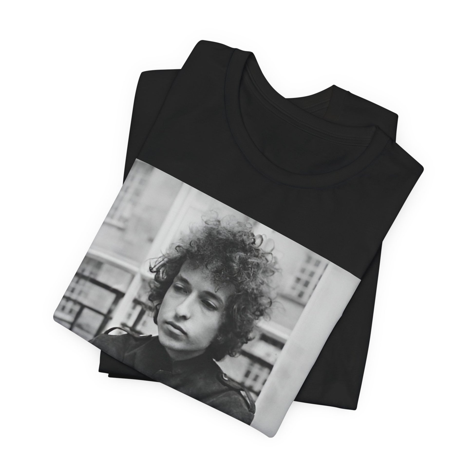 A black graphic t-shirt featuring a black and white graphic of Bob Dylan from the folk revival era.