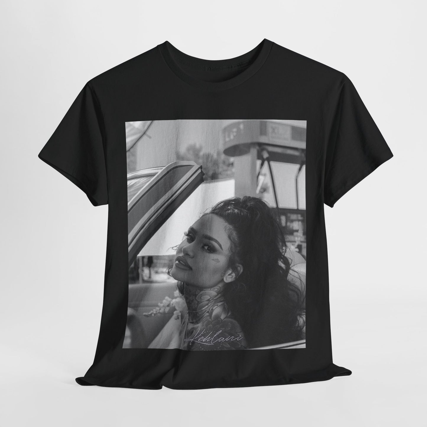 A black graphic t-shirt featuring a black and white retro photo or graphic of Kehlani.