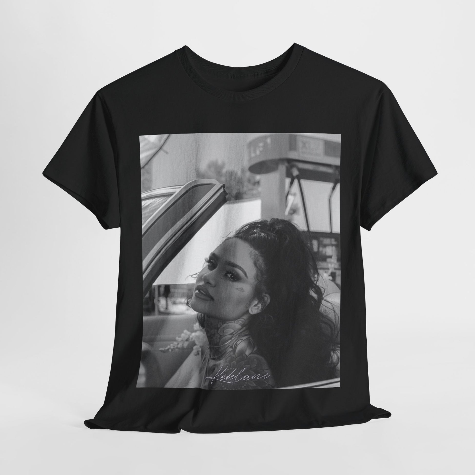 A black graphic t-shirt featuring a black and white retro photo or graphic of Kehlani.