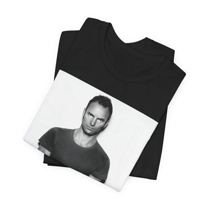 A black graphic t-shirt featuring a black and white portrait photo of Sting.