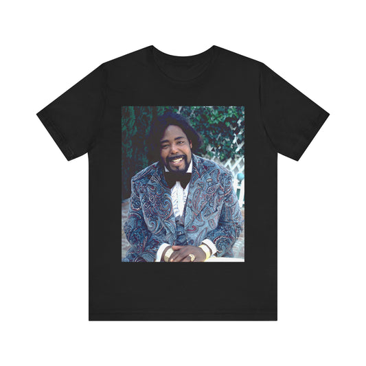 A black graphic t-shirt featuring a retro 70s photo of Barry White, evoking the disco era.