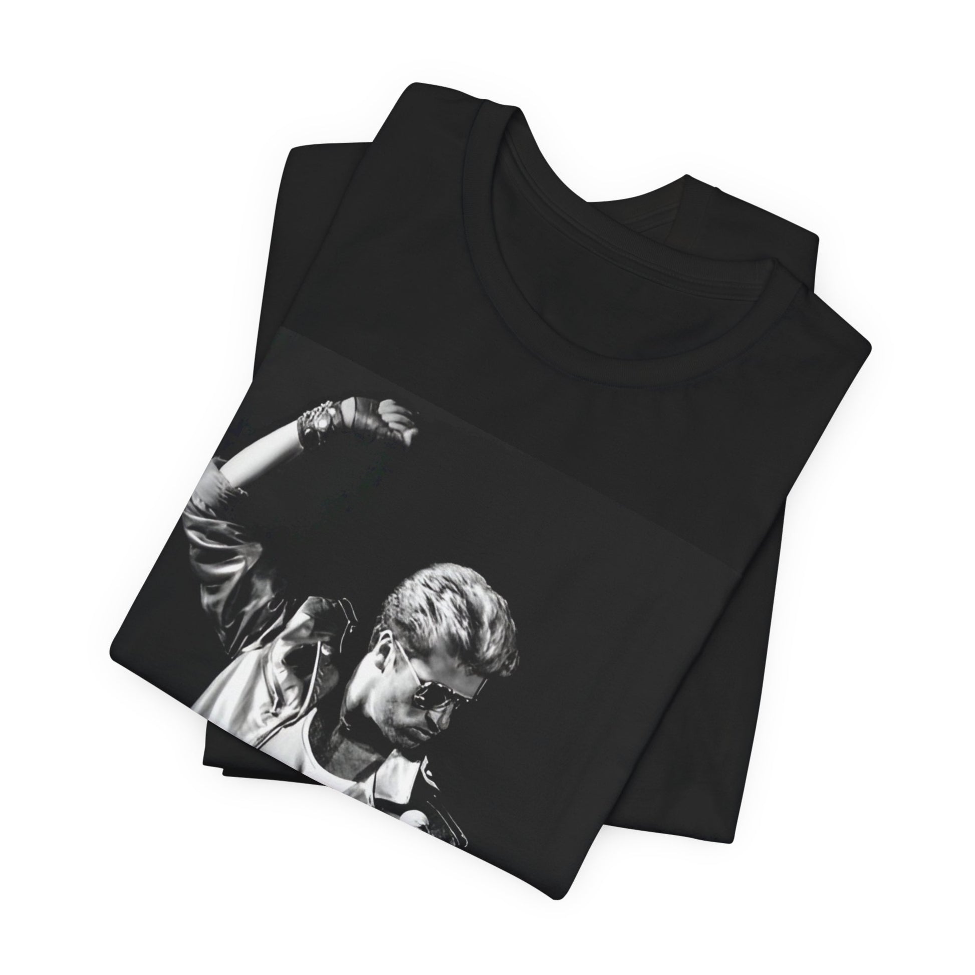 A black graphic t-shirt featuring an iconic black and white portrait photo of George Michael.