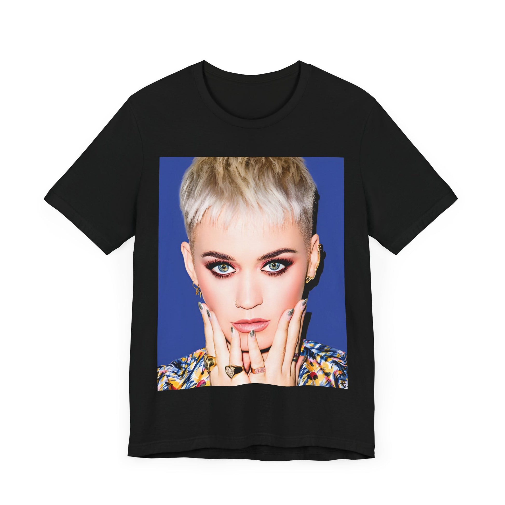 A black graphic t-shirt featuring a graphic of Katy Perry as a global pop phenomenon.