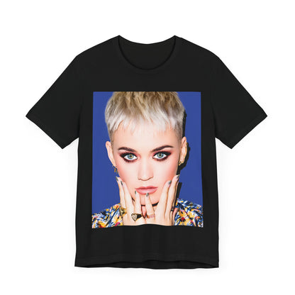 A black graphic t-shirt featuring a graphic of Katy Perry as a global pop phenomenon.