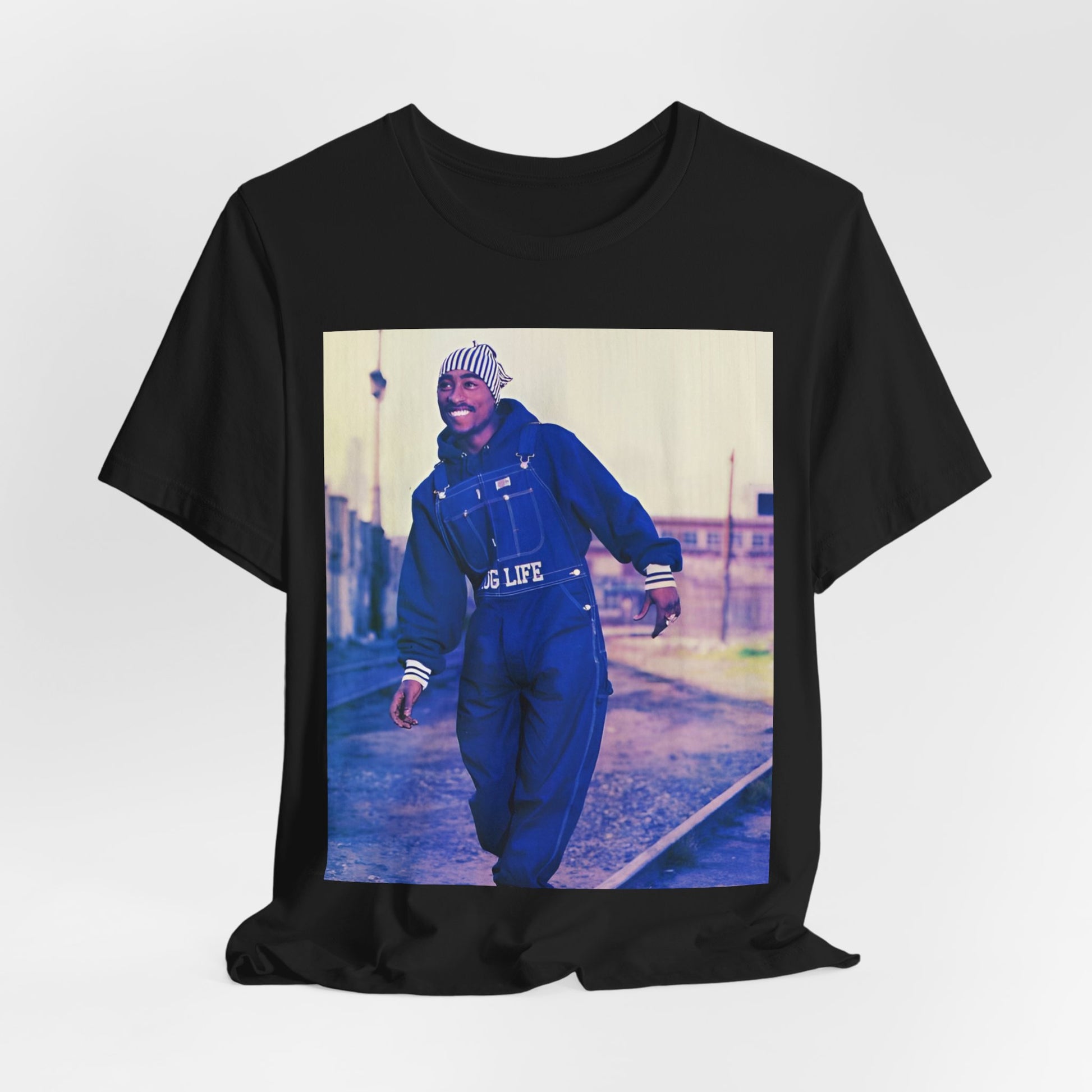 A black graphic t-shirt featuring a retro graphic related to Tupac's 'All Eyez On Me' album era.