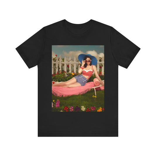 A black graphic t-shirt featuring a graphic related to Katy Perry's "California Gurls" song, with beach vibes.