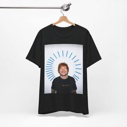 A black graphic t-shirt featuring a classic photo portrait of Ed Sheeran in a folk-pop style.