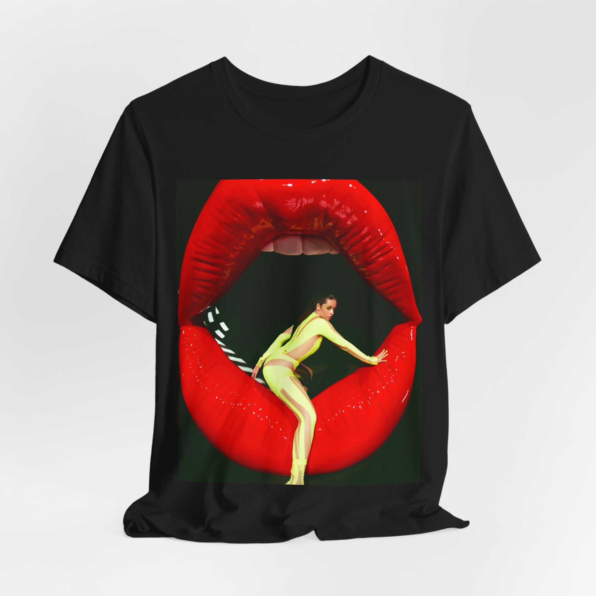 A black graphic t-shirt featuring a graphic of Camila Cabello with a 'rebel heart' or edgy pop star aesthetic.