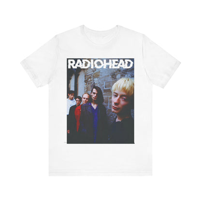 A black graphic t-shirt featuring a 90s graphic related to Radiohead's 'Karma Police' song or era.