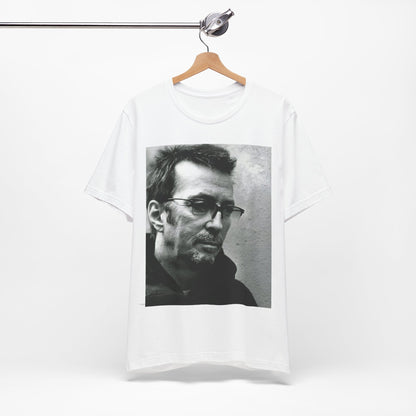 A black graphic t-shirt featuring a black and white, monochrome graphic or photo of Eric Clapton.