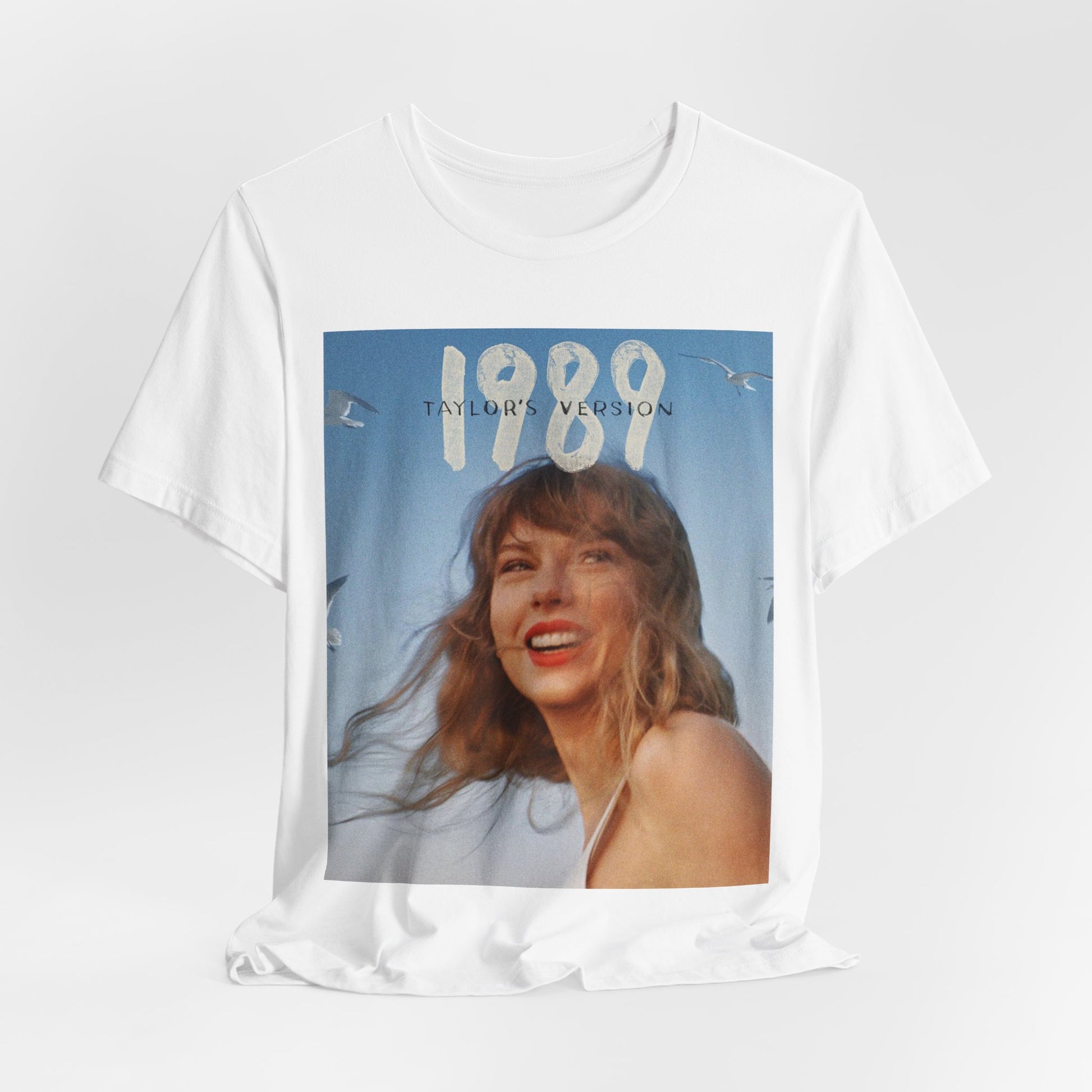 A black graphic t-shirt featuring a graphic related to Taylor Swift's 1989 album.