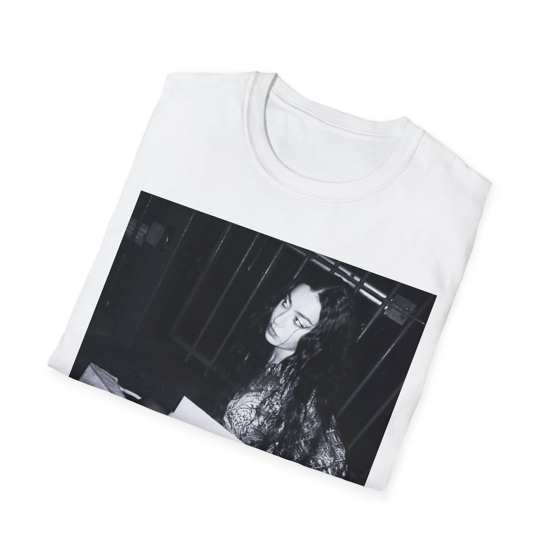 A black graphic t-shirt featuring a graphic related to Charli XCX's 'Brat' album.