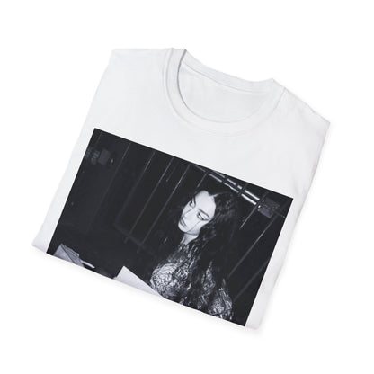 A black graphic t-shirt featuring a graphic related to Charli XCX's 'Brat' album.