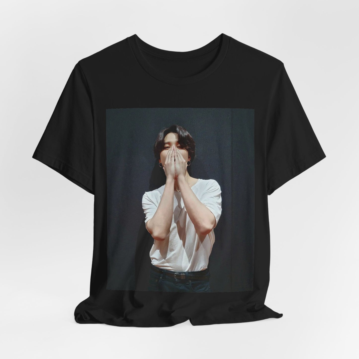 A black graphic t-shirt featuring a graphic of Jimin designed for everyday K-Pop style.