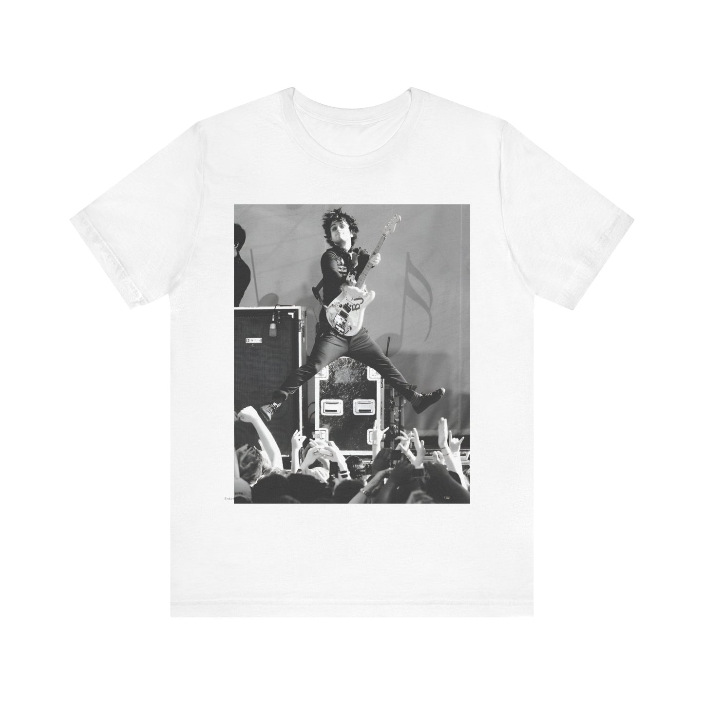 A black graphic t-shirt featuring a graphic of Billie Joe Armstrong from Green Day jumping on stage during a performance.