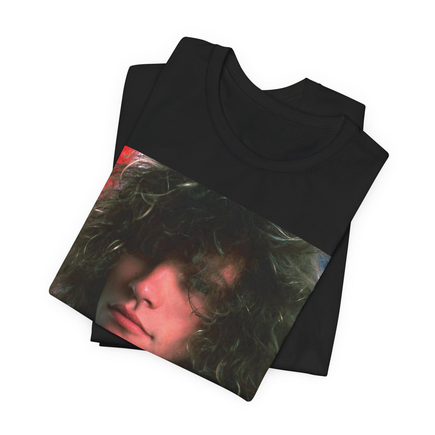 A black graphic t-shirt featuring a graphic of Bon Jovi, possibly with a Superman logo or a tattoo-inspired design.