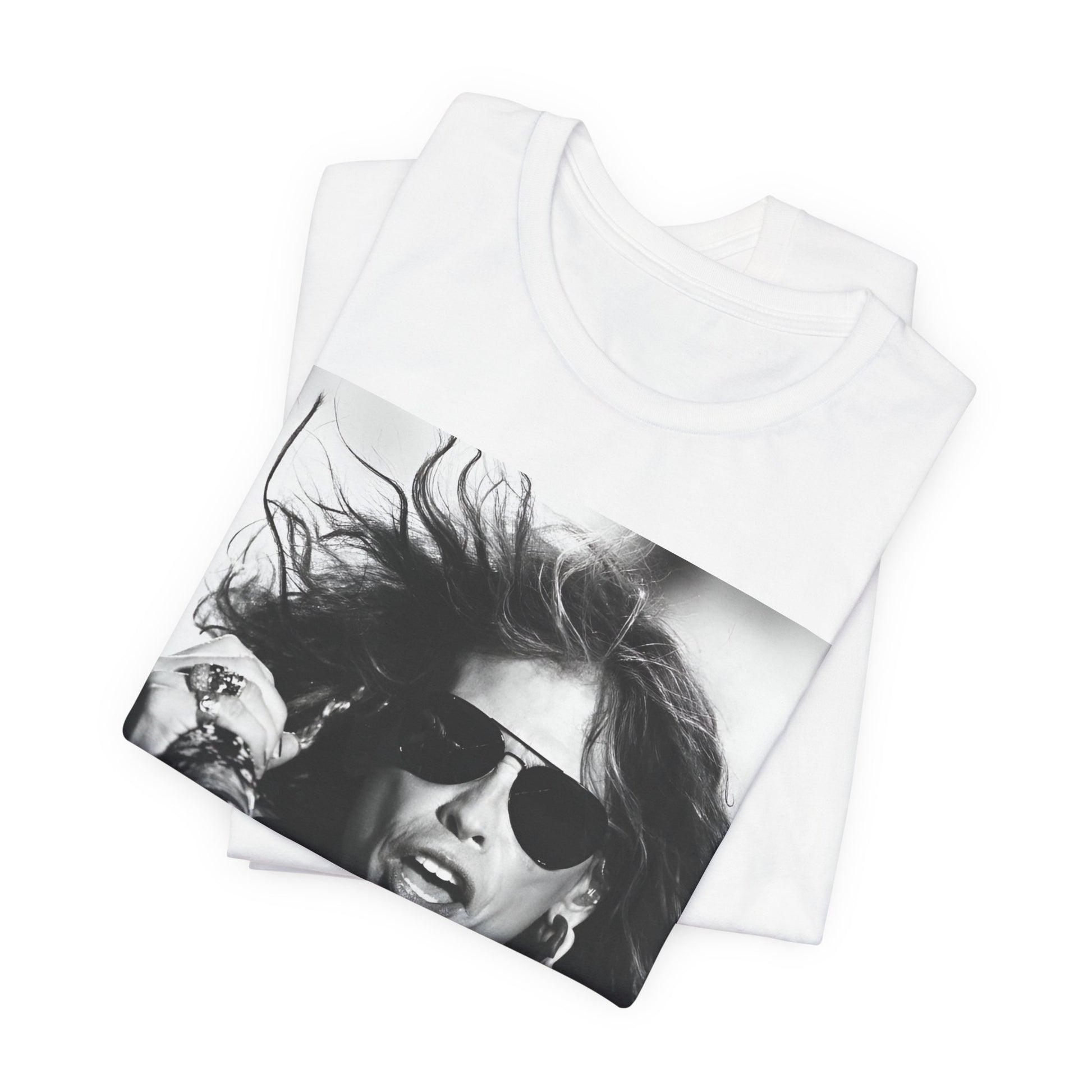 A black graphic t-shirt featuring a black and white photo of Aerosmith's Steven Tyler with his signature scarf and microphone, captured during a dynamic performance.
