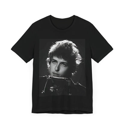 A black graphic t-shirt featuring a graphic of Bob Dylan from the 60s playing his harmonica.