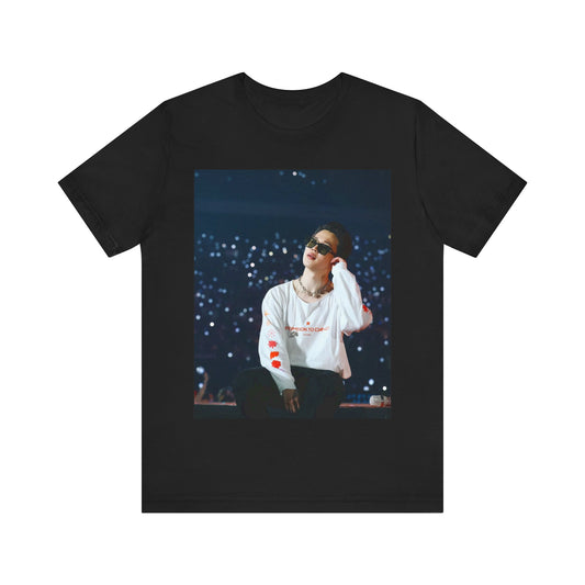 A black graphic t-shirt featuring a vintage aesthetic graphic related to Jimin's 'Lie' era.