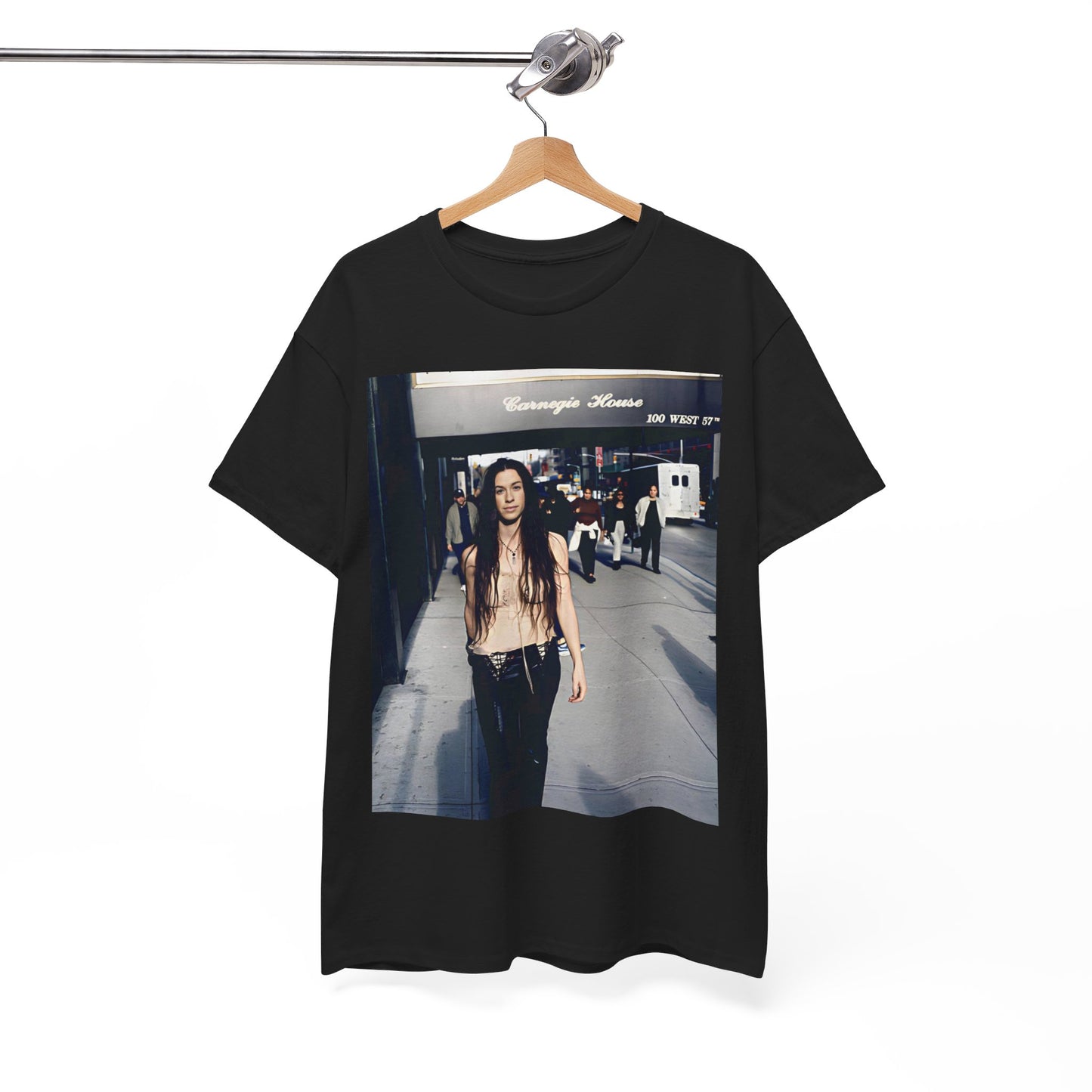 A black graphic t-shirt featuring a 90s-style graphic of Alanis Morissette with New York City elements or skyline in the background.
