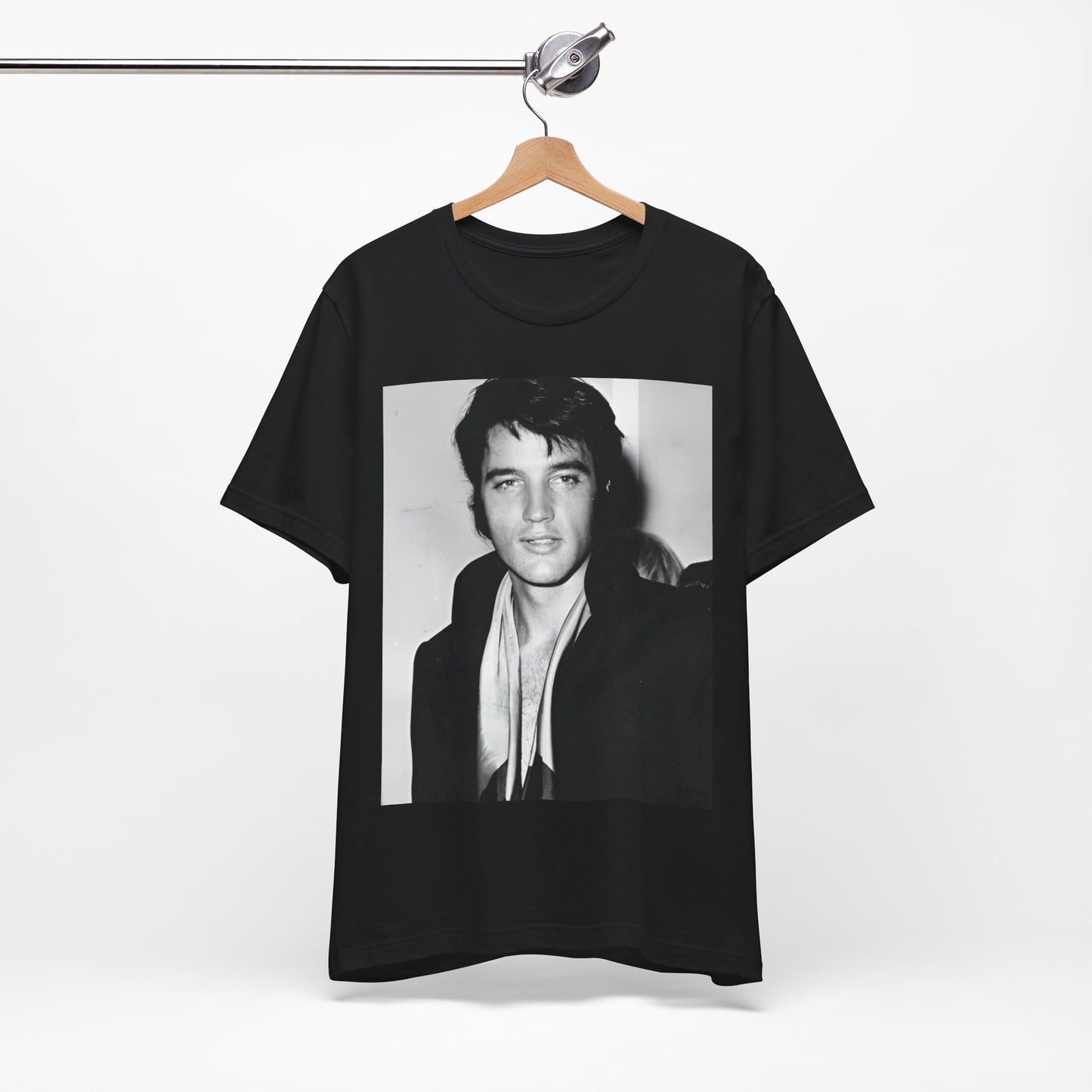 A black graphic t-shirt featuring a black and white rock and roll portrait photo of Elvis Presley.