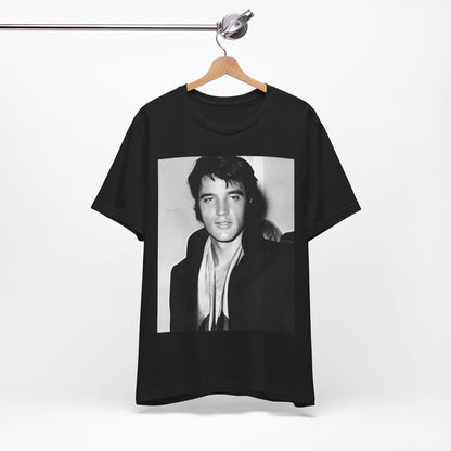 A black graphic t-shirt featuring a black and white rock and roll portrait photo of Elvis Presley.
