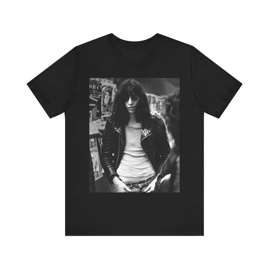 A black graphic t-shirt featuring a 70s black and white photo portrait of Joey Ramone from Ramones.