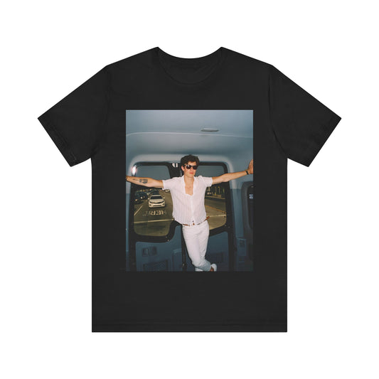 A black graphic t-shirt featuring a graphic of Shawn Mendes with a classic confident look.