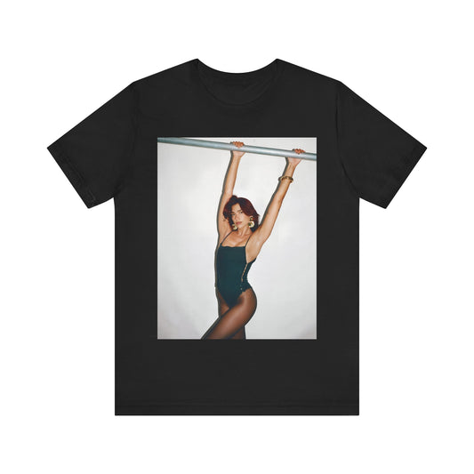 A black graphic t-shirt featuring a graphic related to Dua Lipa's "Levitating" song or era.