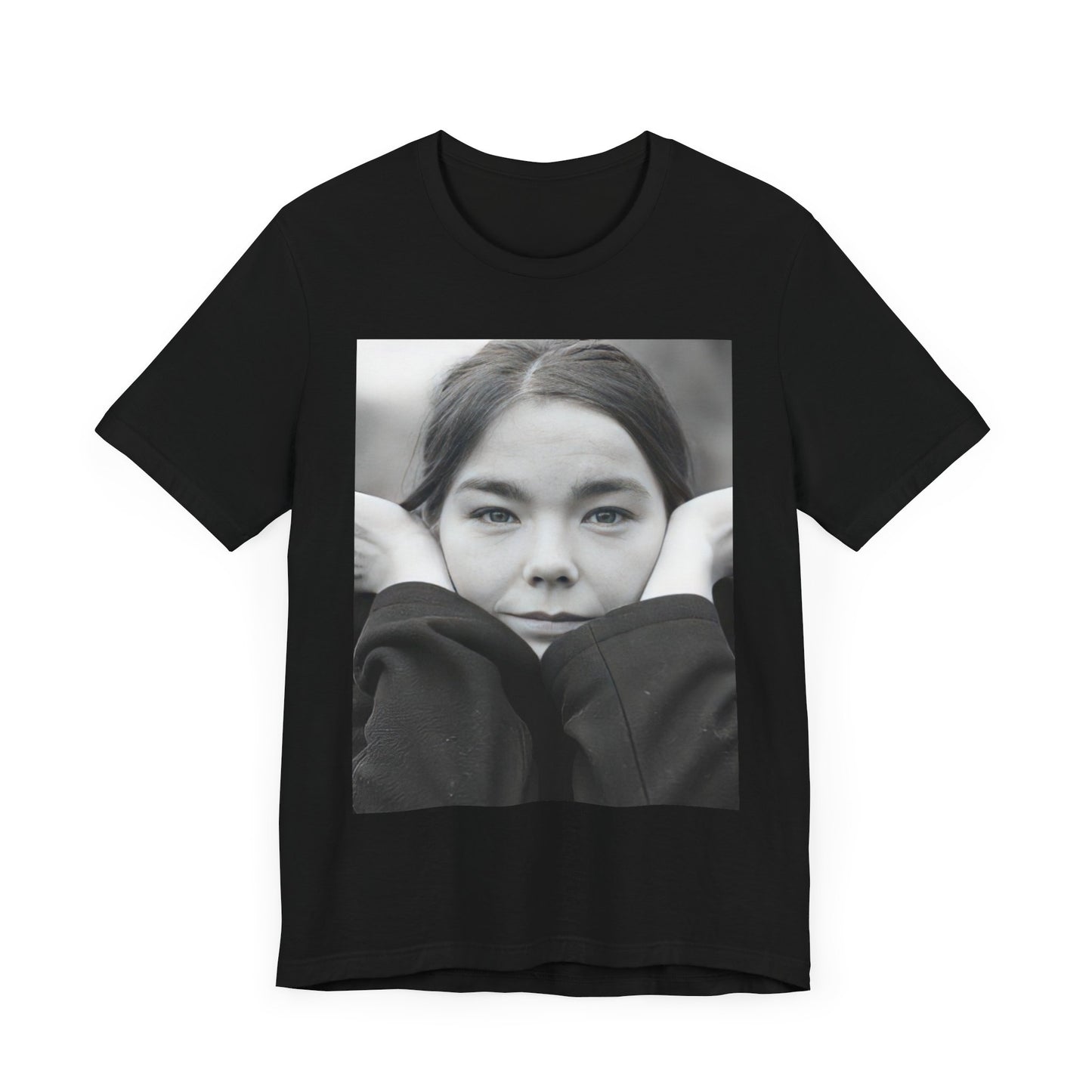 A black graphic t-shirt featuring a black and white portrait photo of Bjork.