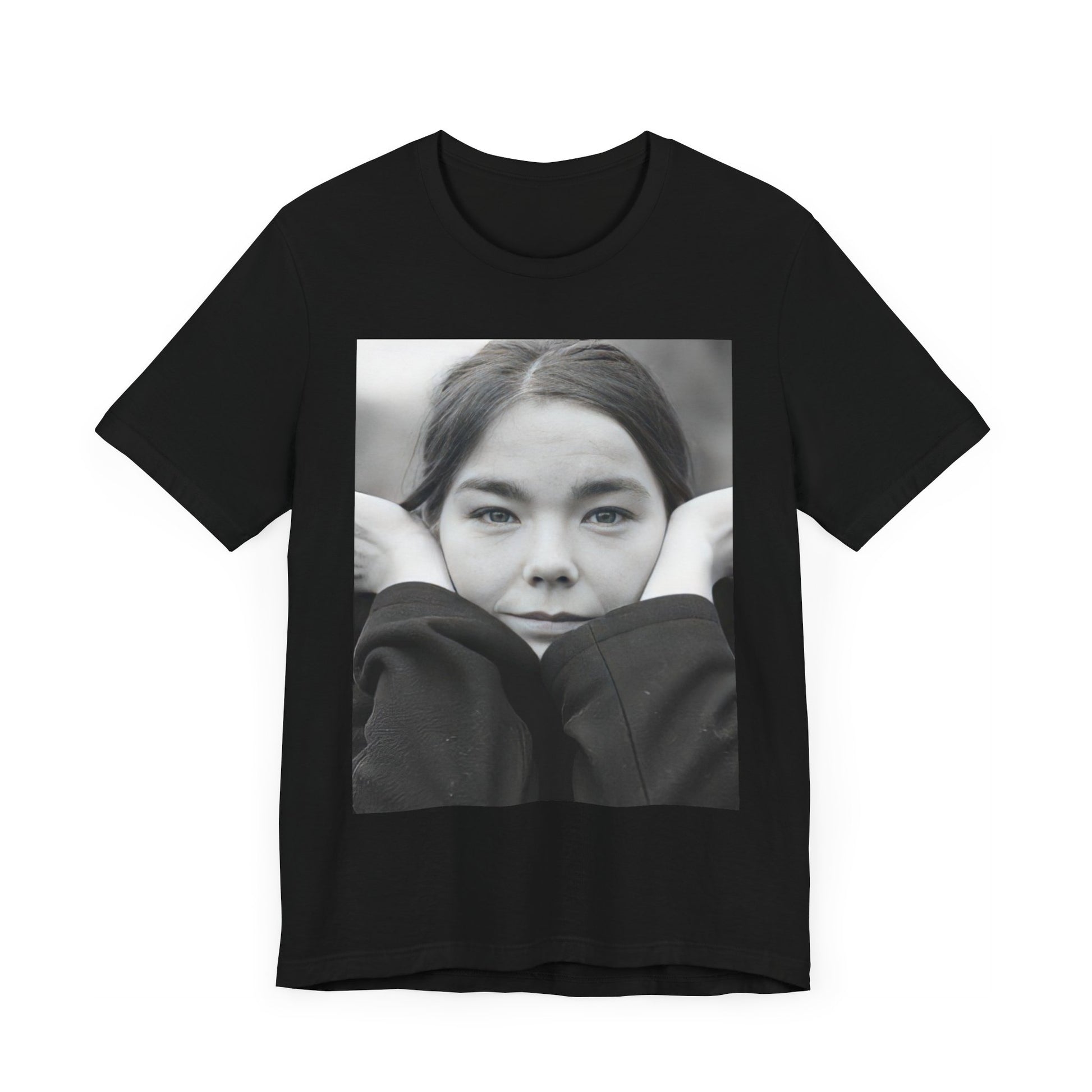 A black graphic t-shirt featuring a black and white portrait photo of Bjork.