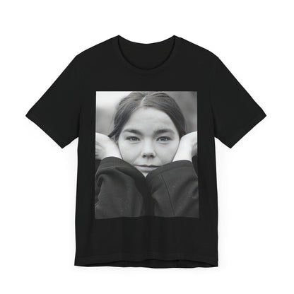 A black graphic t-shirt featuring a black and white portrait photo of Bjork.