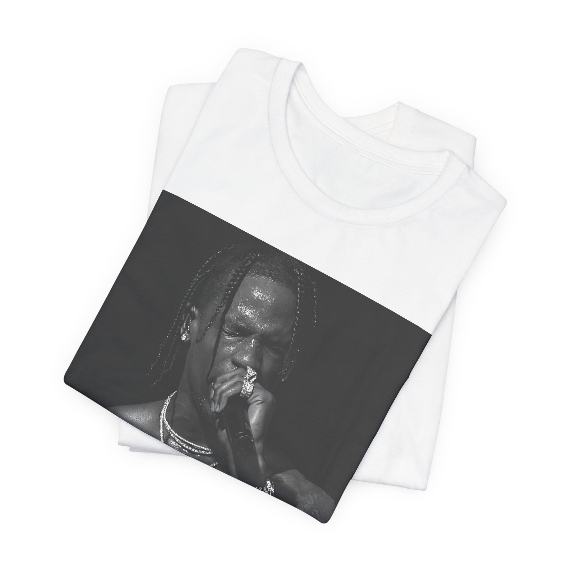 A black graphic t-shirt featuring an underground hip hop graphic of Travis Scott.