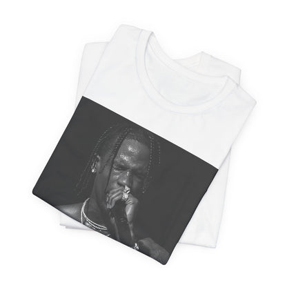 A black graphic t-shirt featuring an underground hip hop graphic of Travis Scott.