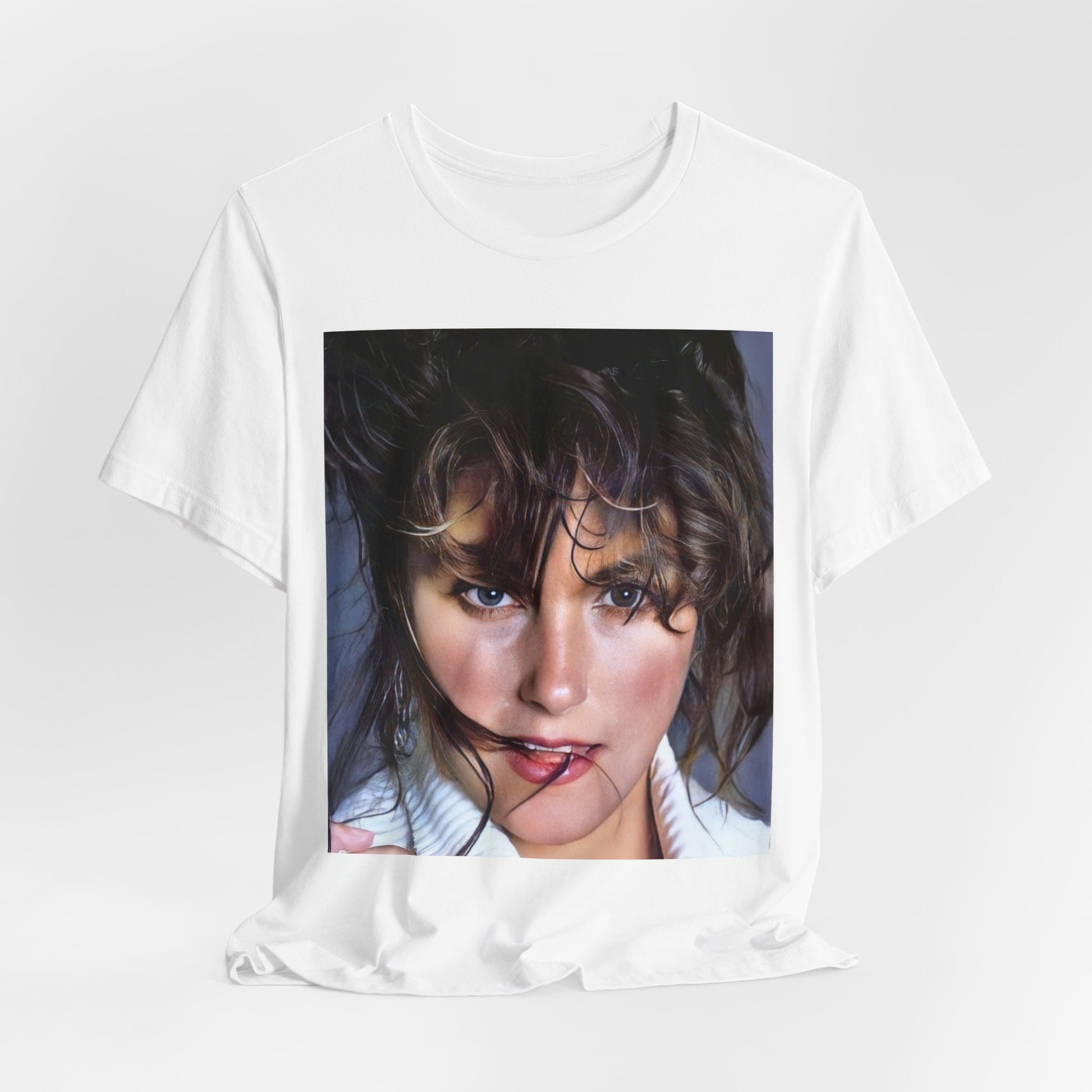 A black graphic t-shirt featuring an 80s style graphic of Laura Branigan.