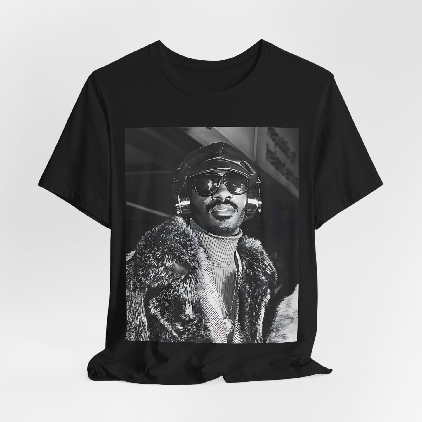 A black graphic t-shirt featuring a 70s black and white graphic of Stevie Wonder as a Motown legend.