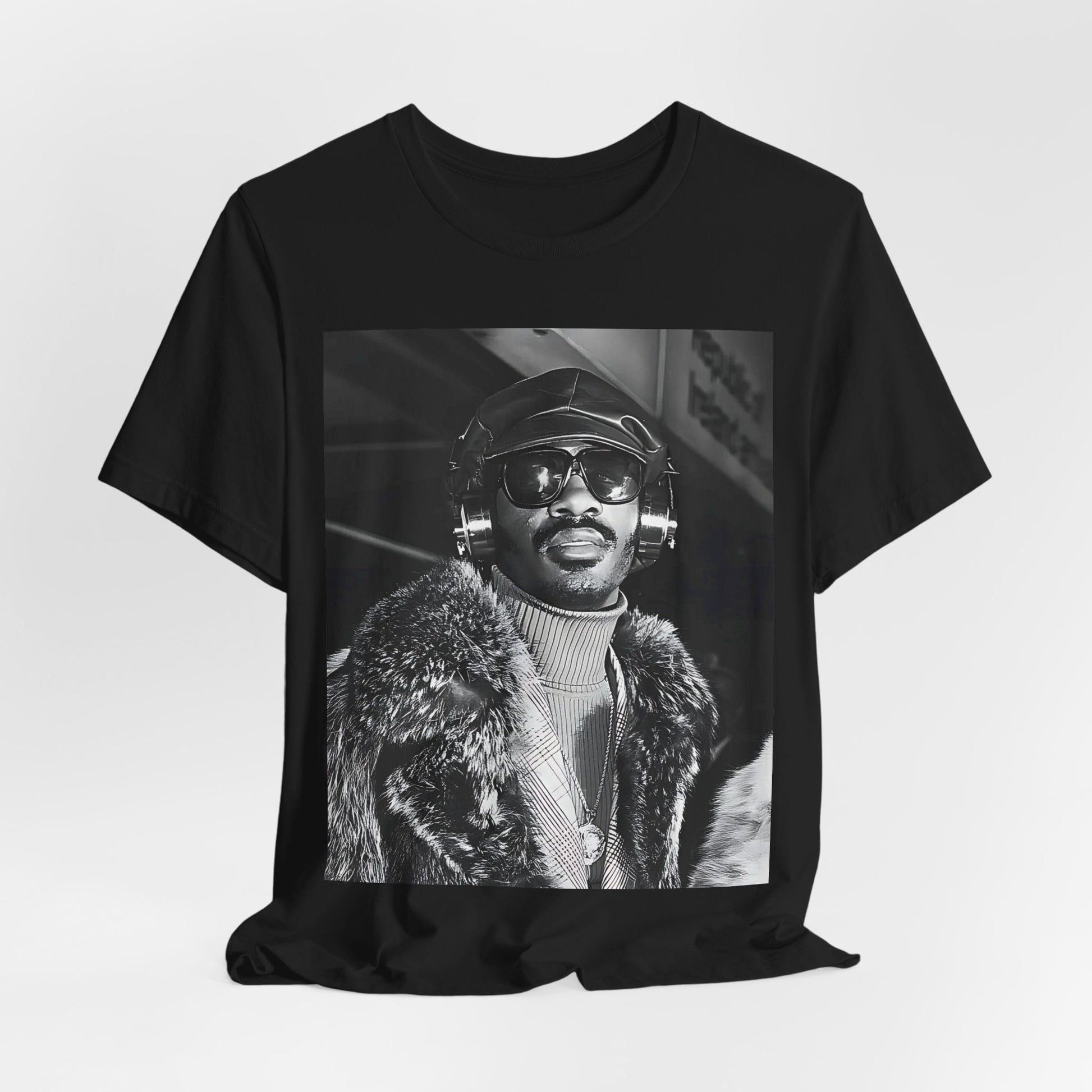 A black graphic t-shirt featuring a 70s black and white graphic of Stevie Wonder as a Motown legend.