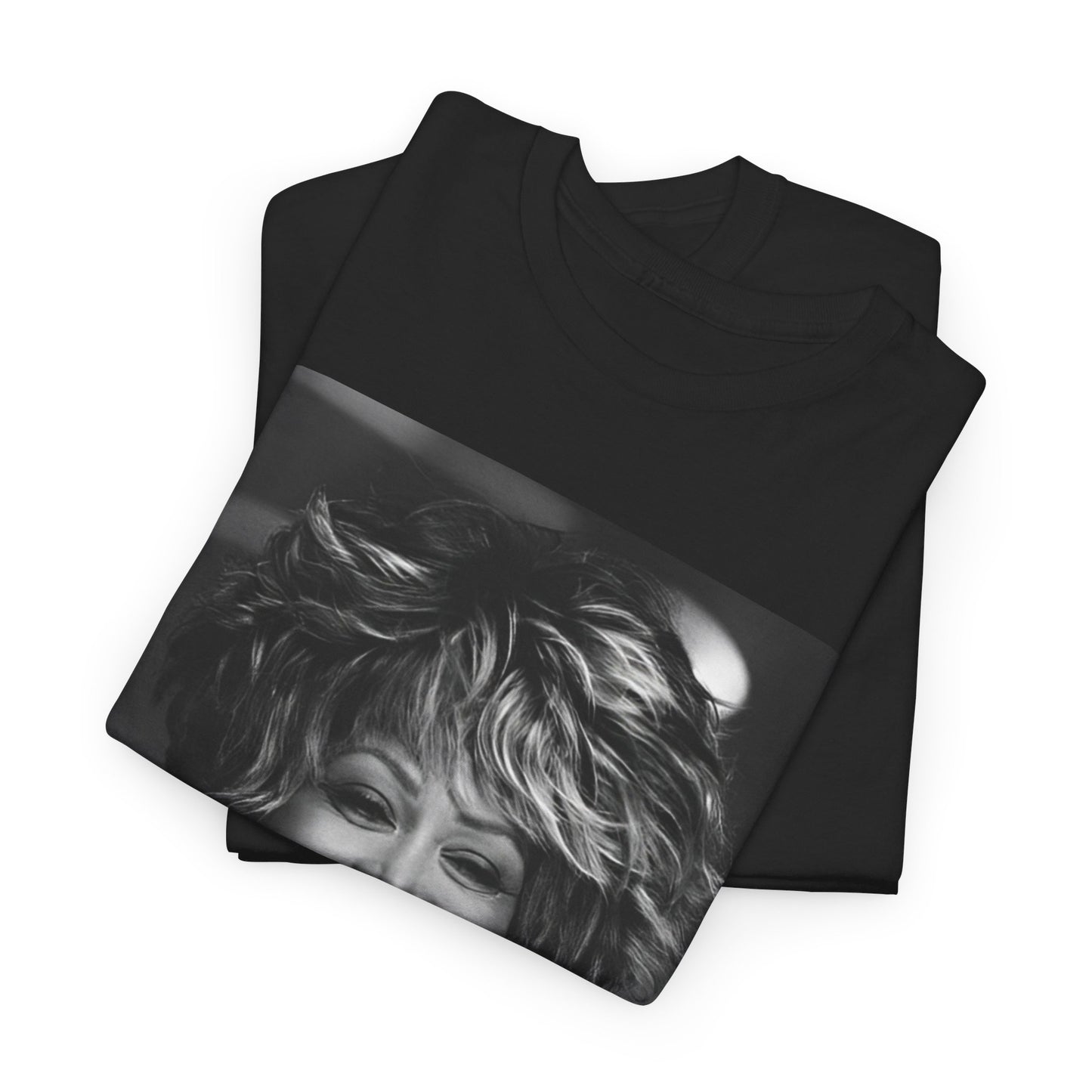 A black graphic t-shirt featuring a classic 80s pop aesthetic graphic of Tina Turner.