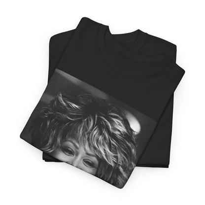 A black graphic t-shirt featuring a classic 80s pop aesthetic graphic of Tina Turner.