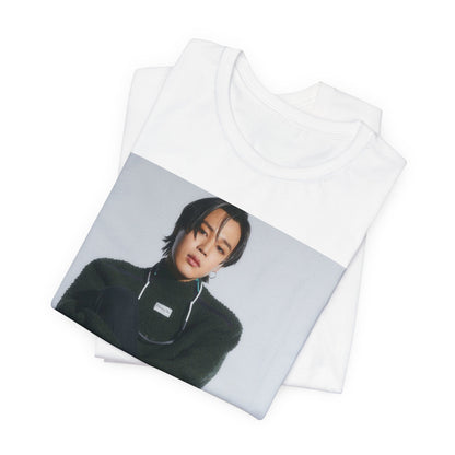 A black graphic t-shirt featuring a modern K-Pop essential graphic of Jimin.
