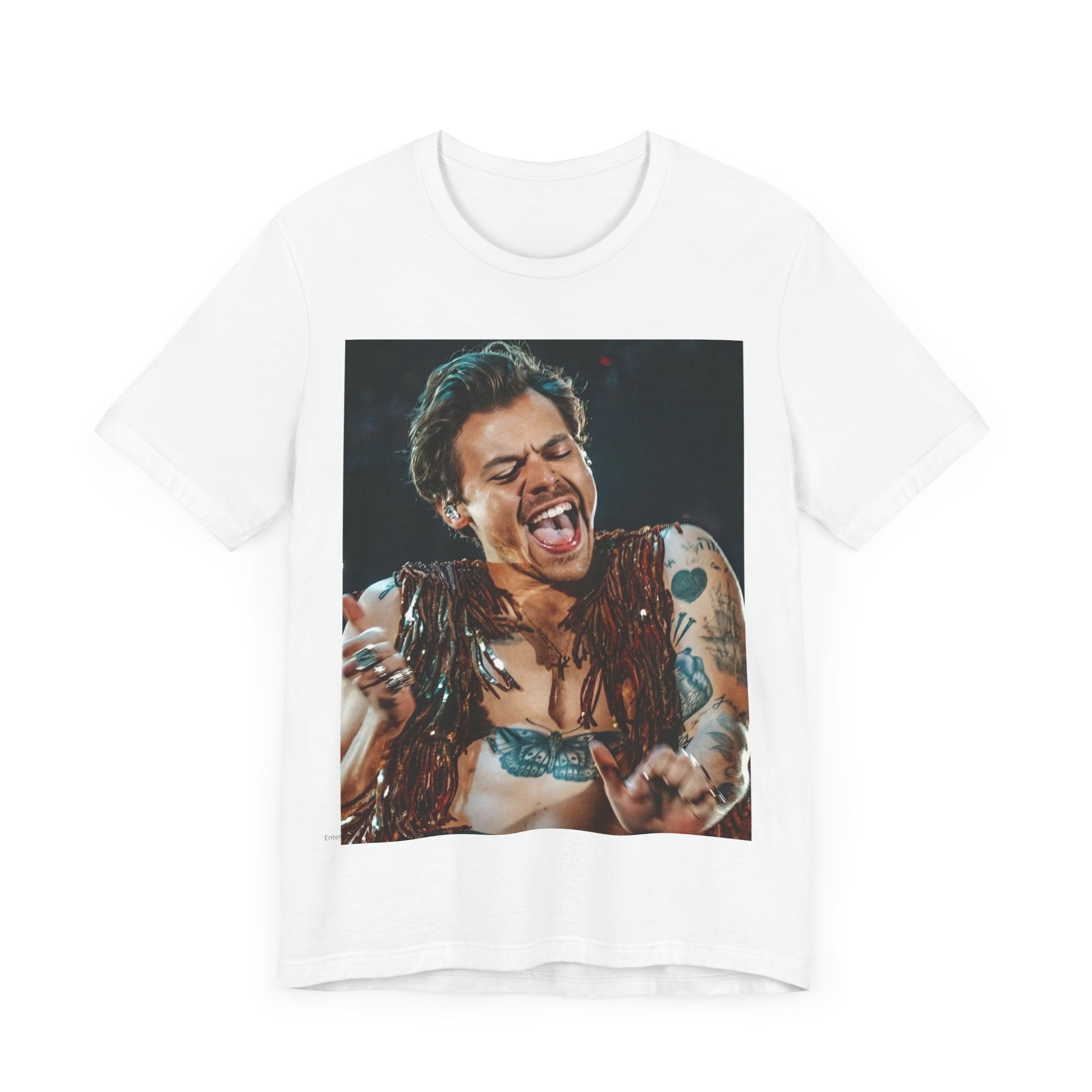 A black graphic t-shirt featuring a graphic or photo of Harry Styles performing live on stage.