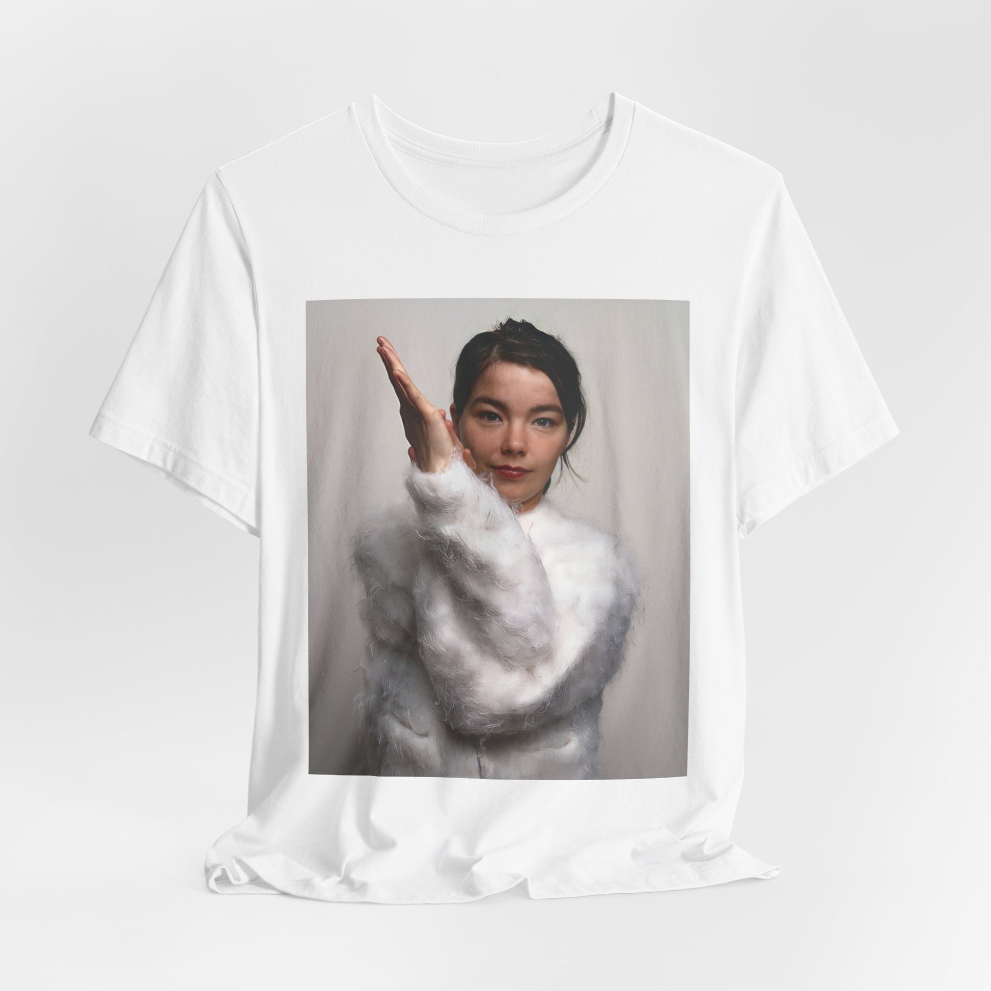 A black graphic t-shirt featuring a classic indie music graphic of Bjork.