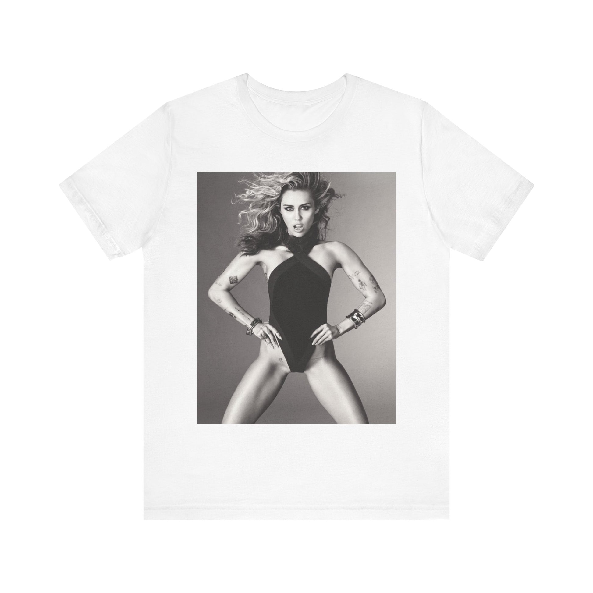 A black graphic t-shirt featuring a bold graphic of Miley Cyrus as a pop superstar.