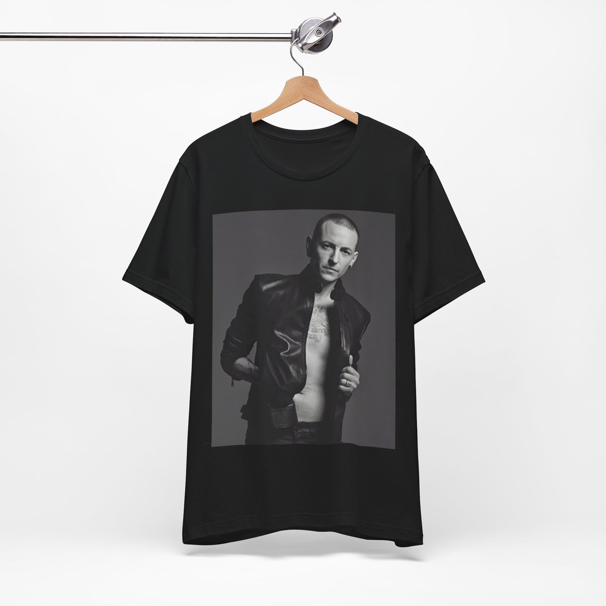 A black graphic t-shirt featuring a graphic of Chester Bennington from Linkin Park as a rock icon.