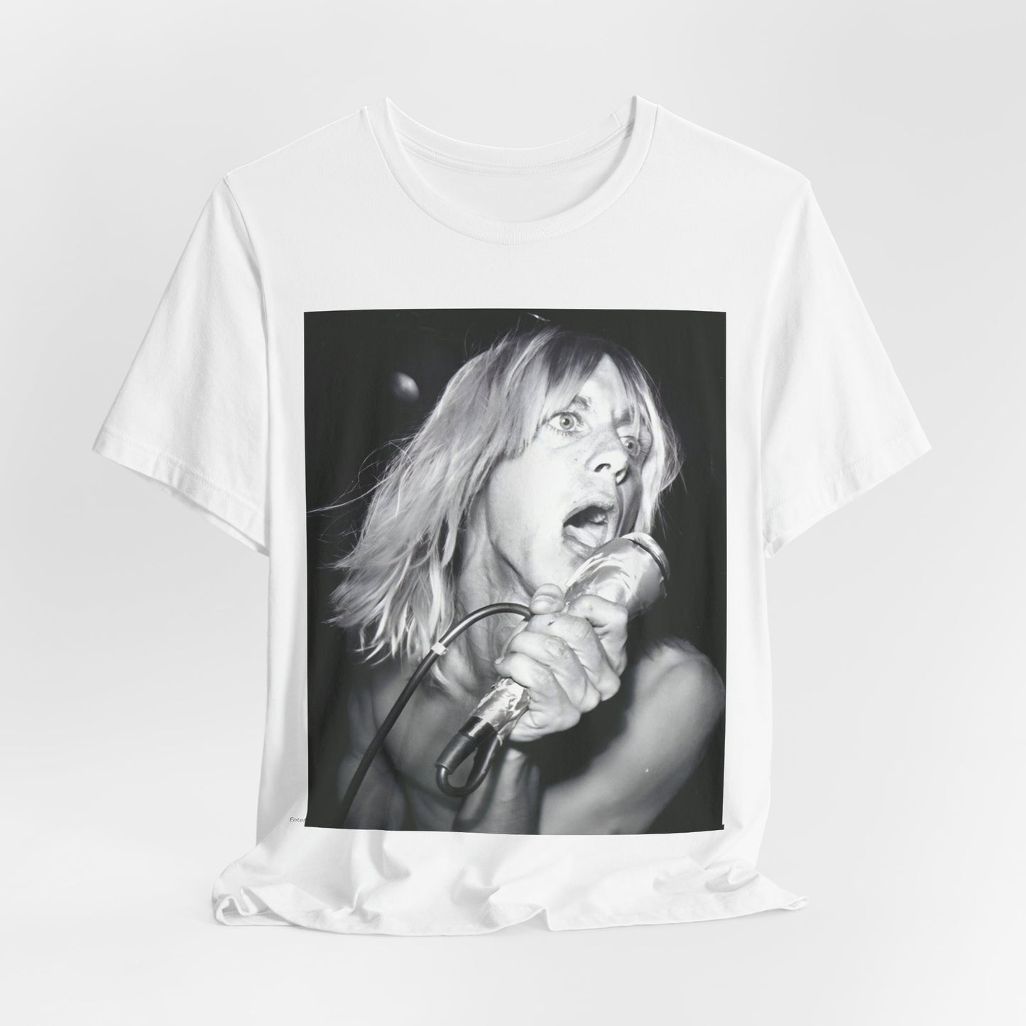 A black graphic t-shirt featuring a graphic of Iggy Pop as the Godfather of Punk, performing live.